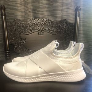 Womens white puremotion adapt adidas pull on sneaker. Never worn. New with tags